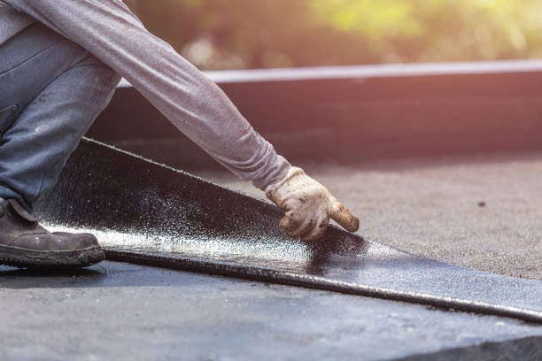 Professional Basement Waterproofing technician working in Massapequa Park, NY